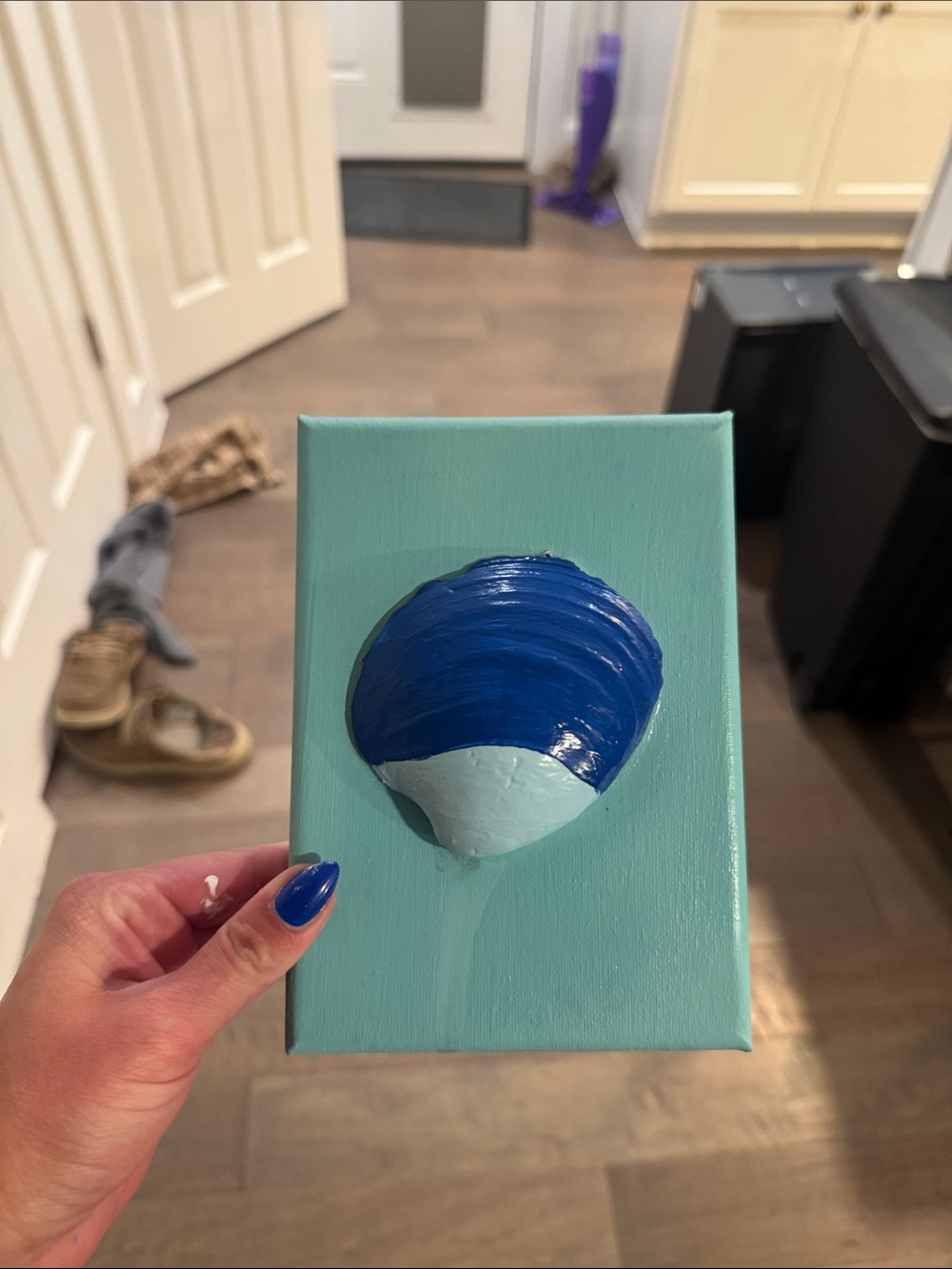 Handmade Blue Shell Wall Art on Teal Canvas